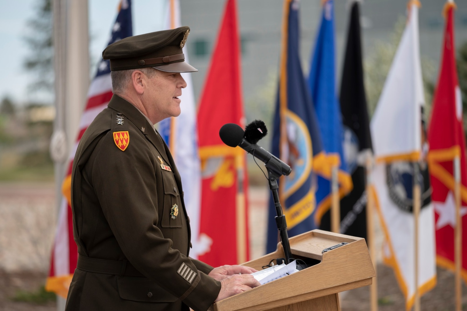 U.S. Army Gen. James Dickinson, commander of United States Space Command, addresses a crowd of service members and Gold Star families during USSPACECOM’s Gold Star service flag raising ceremony May 7 at Peterson Air Force Base, Colorado. The ceremony was held in conjunction with Gold Star Awareness Month.