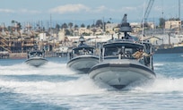 Sailors assigned to Coastal Riverine Squadron (CRS) 1 underway in transit at San Diego bay during a live fire exercise conducted by Coastal Riverine Group (CRG) 1 Training and Evaluation Unit (TEU).