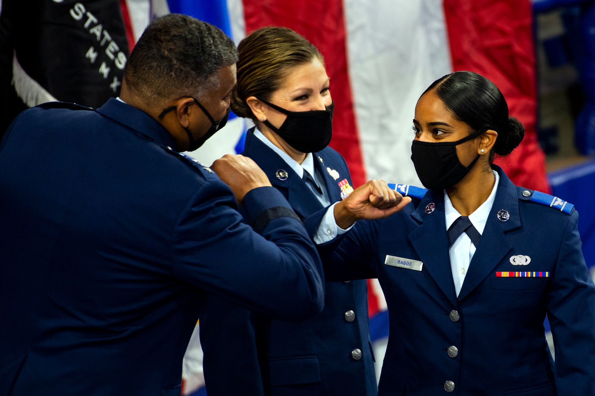 A U. S. Air Force Academy Preparatory School cadet candidate bumps elbows with Lt. Gen. Richard Clark, the Academy’s superintendent, at the prep school’s graduation ceremony May 12, 2021.