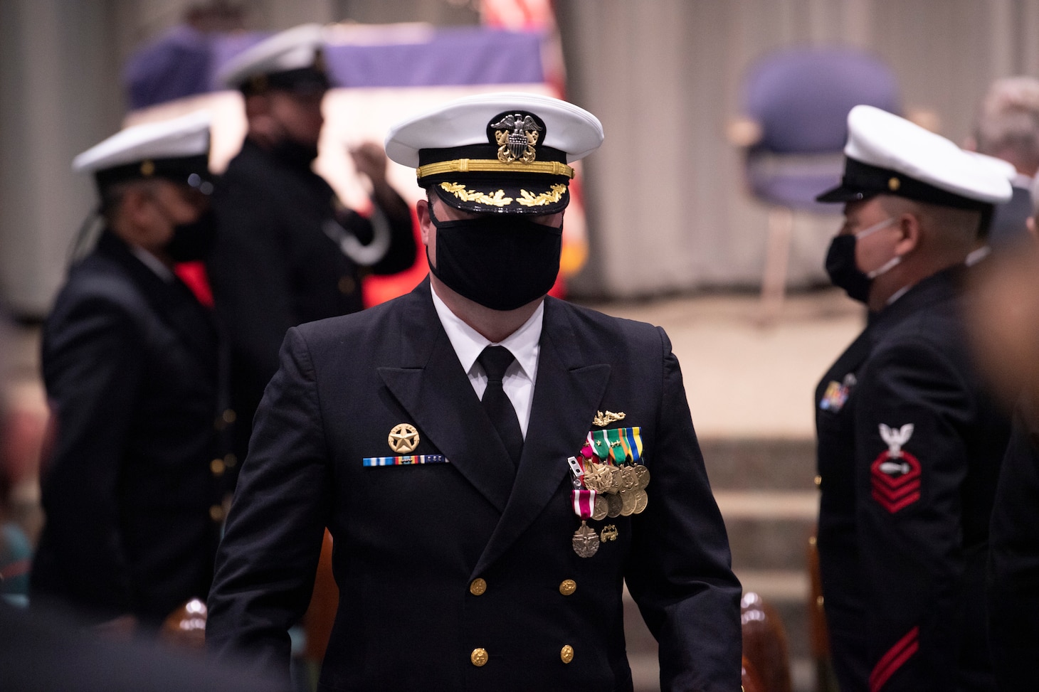 Cmdr. Jeremy Johnston, from Crescent, Oklahoma, departs a change of command ceremony for the Seawolf-class fast-attack submarine USS Seawolf (SSN 21) held at the U.S. Naval Undersea Museum in Keyport, Washington, May 4. During the Ceremony, Cmdr. Jeffrey Fassbender, from St. Marys, Kansas, relieved Johnston, as Seawolf’s commanding officer. (U.S. Navy photo by Mass Communication Specialist 2nd Class Ian Zagrocki)