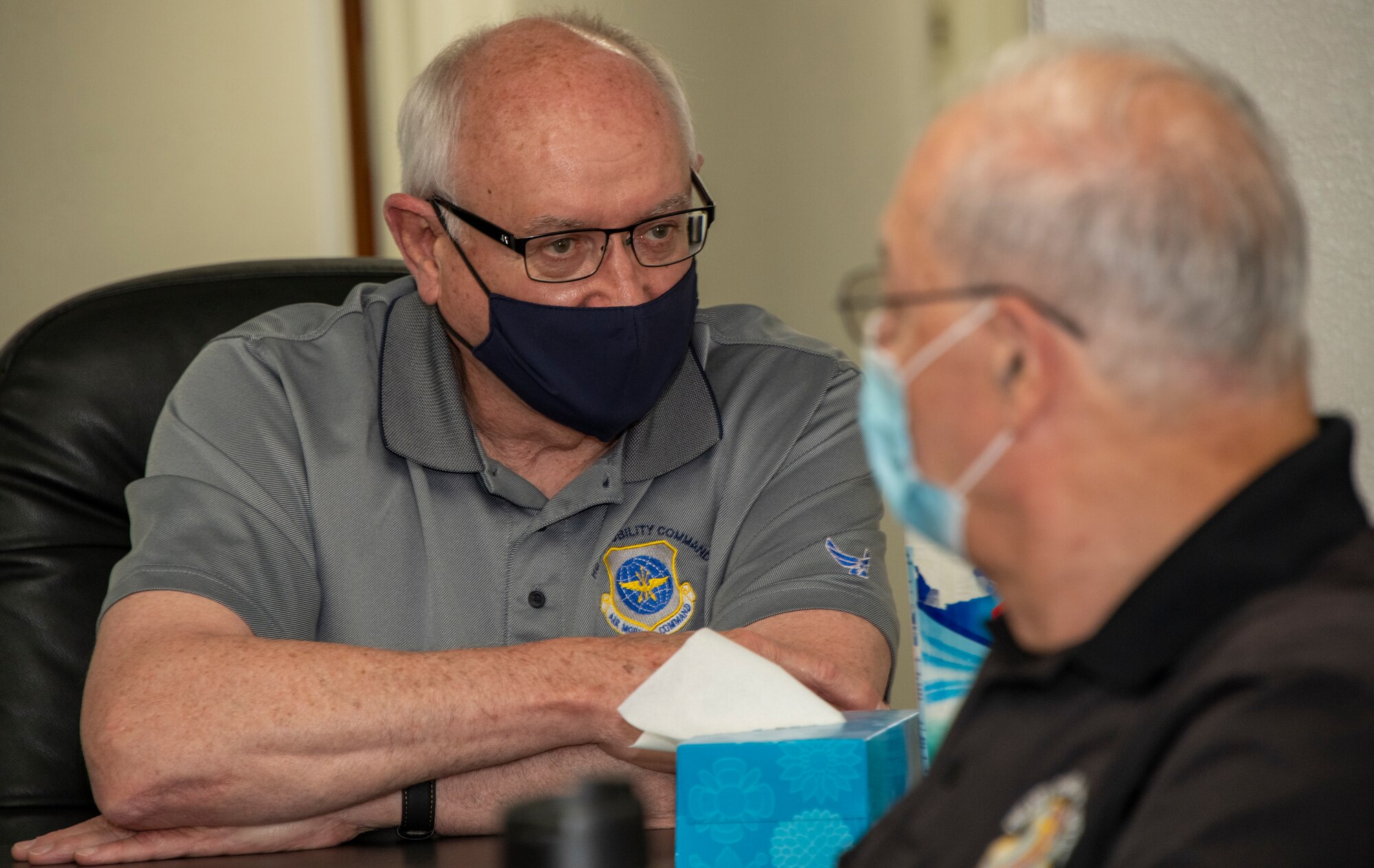 David Graves, left, Air Mobility Command treaty manager and Salvatore Paminella, 60th Air Mobility Wing Treaty Compliance officer, have a discussion during an Air Mobility Command Treaty Workshop May 11, 2021, at Travis Air Force Base, California. The Air Force must comply with international treaties and arms-control related agreements made by the U.S. Government. The Air Force will implement these treaties and agreements by integrating their requirements into the planning, programming, and budgeting system at all levels.  (U.S. Air Force photo by Heide Couch)