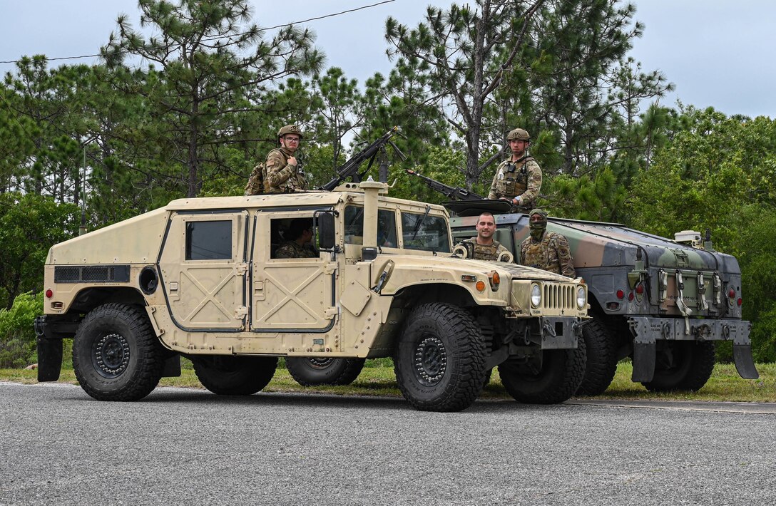 Members of the 822nd Base Defense Group, Moody Air Force Base, Ga., perform a shift change during exercise Agile Flag 21-2 at Naval Outlying Landing Field Choctaw, Fla., May 3, 2021. The primary mission of the 822nd BDS is training to deploy to different theaters.