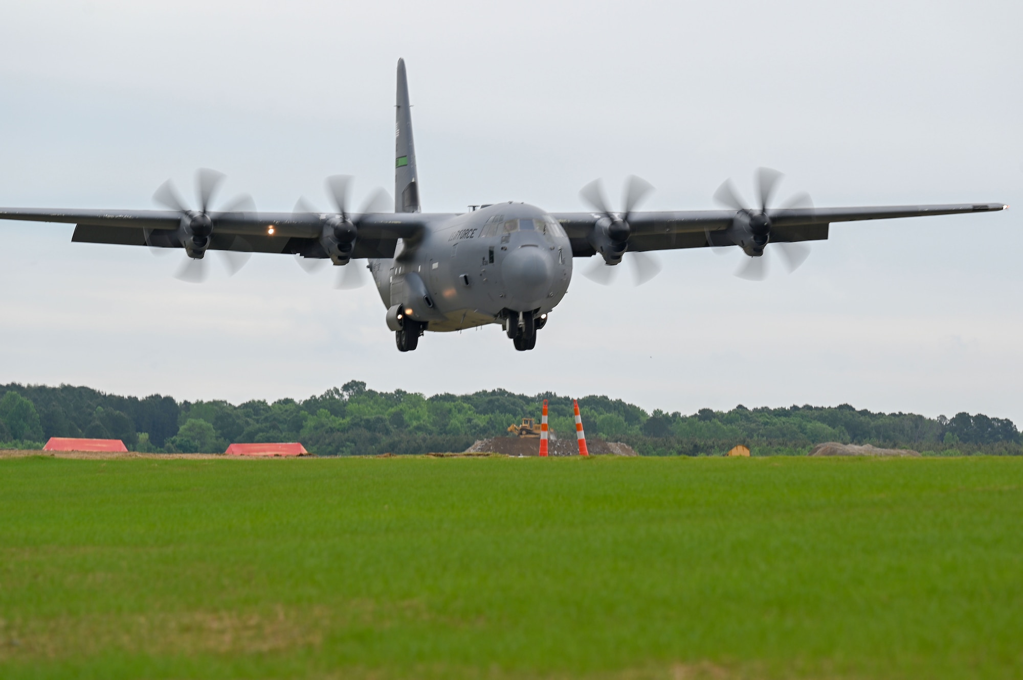 A C-130J lands on an assault landing zone