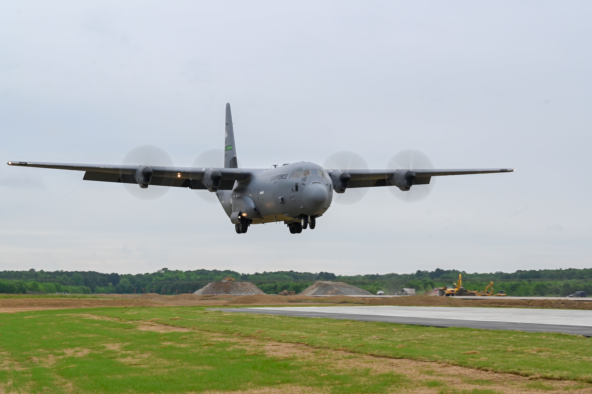 A C-130J lands on an assault landing zone