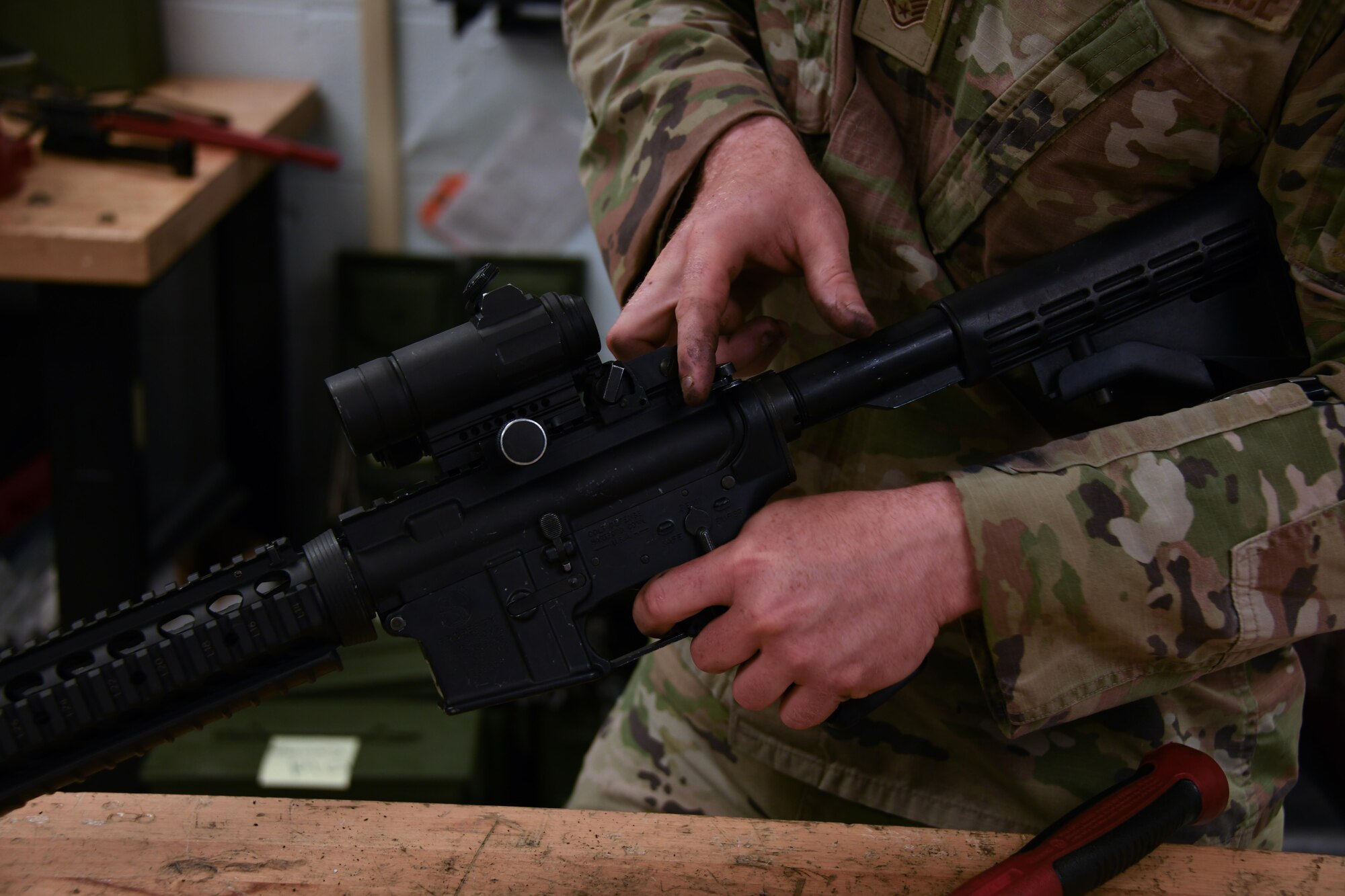 airman fixes rifle
