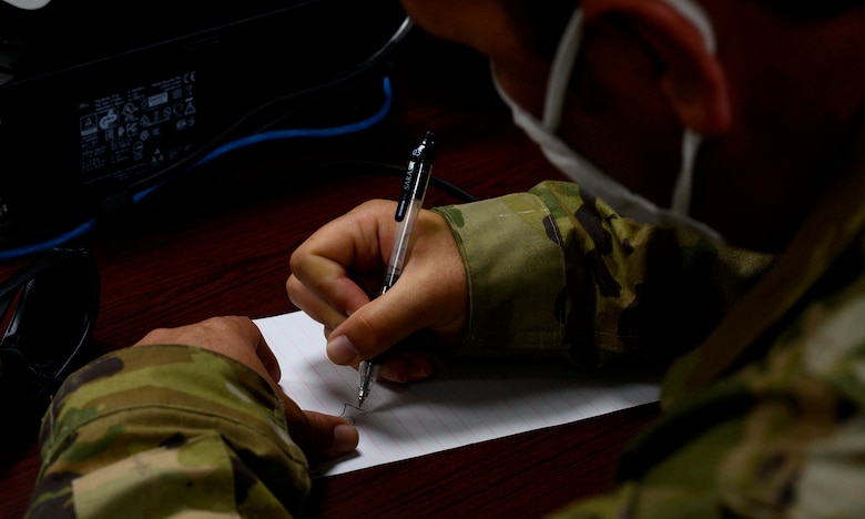 Master Sgt. Anthony Cox, 379th Expeditionary Maintenance Squadron team lead, draws a diagram of a U.S. Air Force F-16 during the classroom portion of “hot pit” refueling training, Prince Sultan Air Base, Kingdom of Saudi Arabia, April 28, 2021. Hot pit refueling is where maintainers refuel an aircraft while the engine is still running, allowing the aircraft to safely and quickly return to flying. (U.S. Air Force Photo by Senior Airman Samuel Earick)