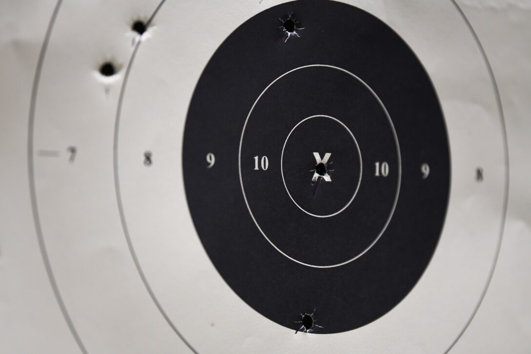 A bullseye target is displayed during an “Excellence Competition” during Police Week at Aviano Air Base, Italy, May 12, 2021. Airmen participating in the competition sat through an in-class portion and hands-on portion. Police Week recognizes the service and sacrifice of U.S. law enforcement members, paying special tribute to those who have lost their lives in the line of duty for the safety and protection of others. (U.S. Air Force photo by Senior Airman Ericka A. Woolever)