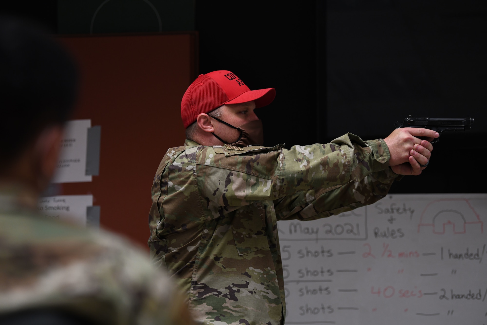 U.S. Air Force Staff Sgt. Jarrett Newman, 31st Security Forces Squadron (SFS) member, teaches a class for an “Excellence Competition” during Police Week at Aviano Air Base, Italy, May 12, 2021.  Airmen participating in the competition sat through an in-class portion and hands-on portion. Police Week pays tribute to the local, state, and federal peace officers who have died, or who have been disabled, in the line of duty. (U.S. Air Force photo by Senior Airman Ericka A. Woolever)