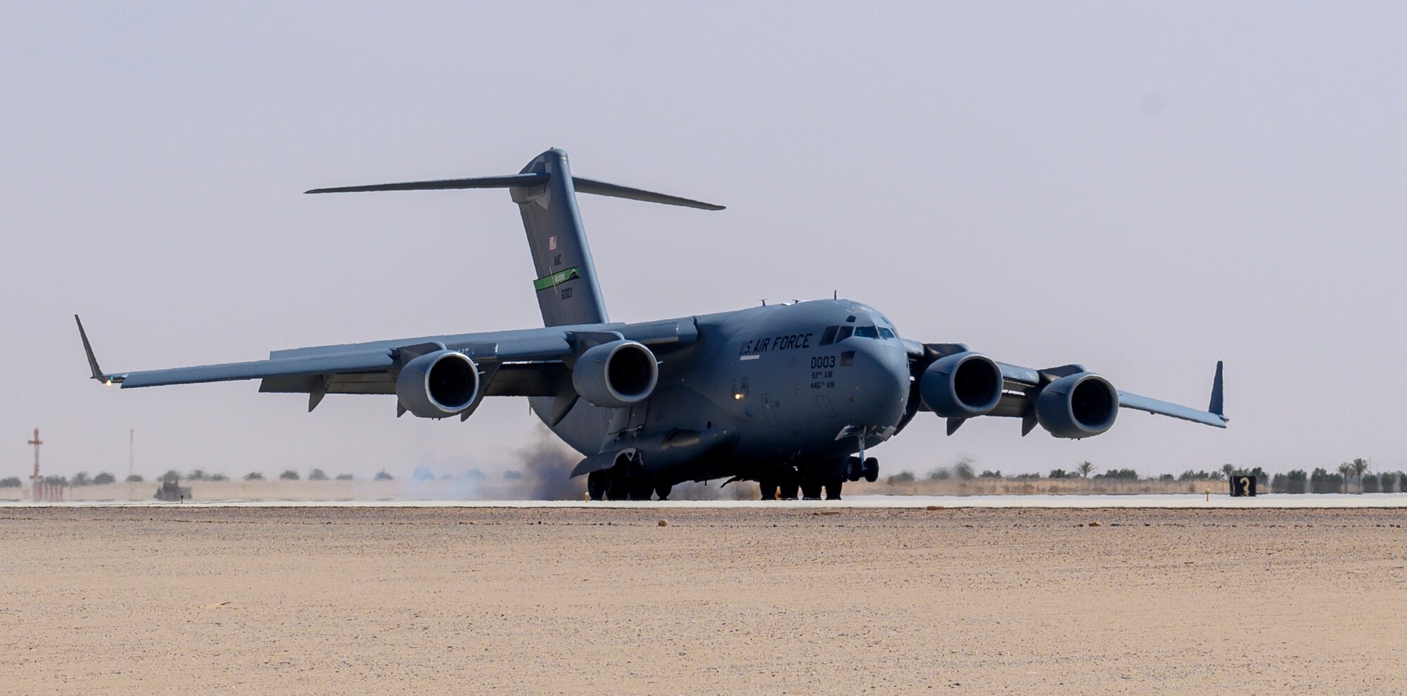 A U.S. Air Force C-17 carrying cargo from Marine Corps Air Station Beaufort, South Carolina, lands on the flightline at Prince Sultan Air Base, Kingdom of Saudi Arabia, May 5, 2021. Personnel, aircraft, and supplies from Marine All Weather Fighter Attack Squadron 224, Marine Aircraft Group 31, deployed as part of a dynamic force employment to PSAB to enhance U.S. Central Command’s ability to deter aggression and promote security and stability within the USCENTCOM area of responsibility. (U.S. Air Force photo by Senior Airman Samuel Earick)