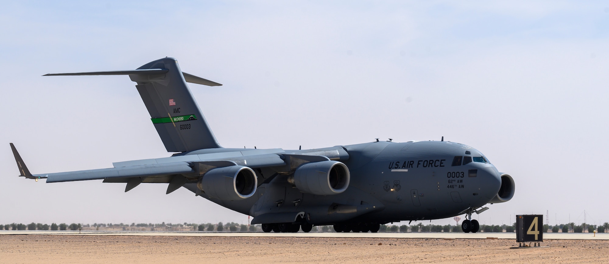 A U.S. Air Force C-17 carrying cargo from Marine Corps Air Station Beaufort, South Carolina, lands on the flightline at Prince Sultan Air Base, Kingdom of Saudi Arabia, May 5, 2021. Personnel, aircraft, and supplies from Marine All Weather Fighter Attack Squadron 224, Marine Aircraft Group 31, deployed as part of a dynamic force employment to PSAB to enhance U.S. Central Command’s ability to deter aggression and promote security and stability within the USCENTCOM area of responsibility. (U.S. Air Force photo by Senior Airman Samuel Earick)