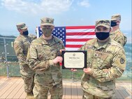 403rd AFSB NCO reenlists atop Apsan Mountain in Daegu, South Korea