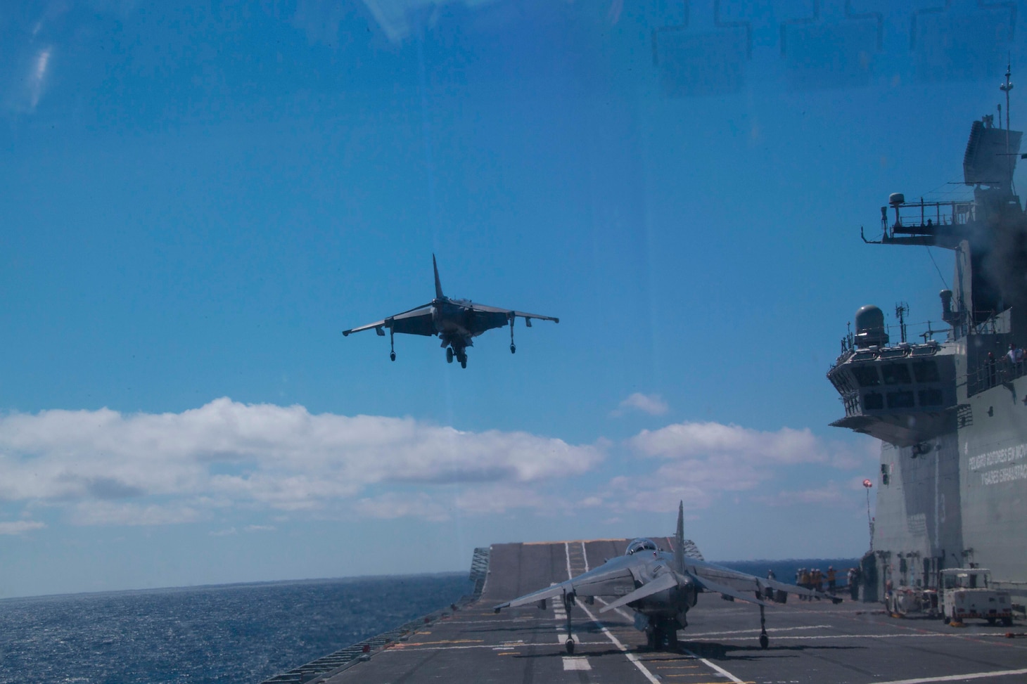 A U.S. Marine Corps AV-8B Harrier with Marine Tilt Rotor Squadron 162 (VMM-162 Rein), 24th Marine Expeditionary Unit (MEU) lands on the deck of the Spanish Navel vessel Juan Carols, April 27, 2021.