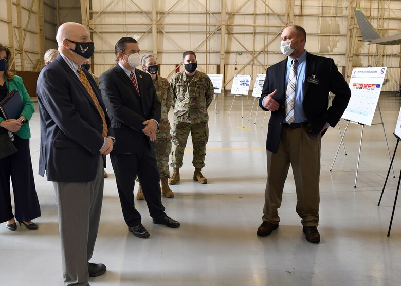 Ben Stuart, 562nd Aircraft Maintenance Squadron deputy director, briefs Acting Secretary of the Air Force John Roth on the C-17 Globemaster III sustainment mission at Robins Air Force Base, Ga., May 10, 2021. The 562nd AMXS, part of the Warner Robins Air Logistics Complex, performs programmed depot maintenance on legacy airframes to ensure the Air Force's readiness for the future.