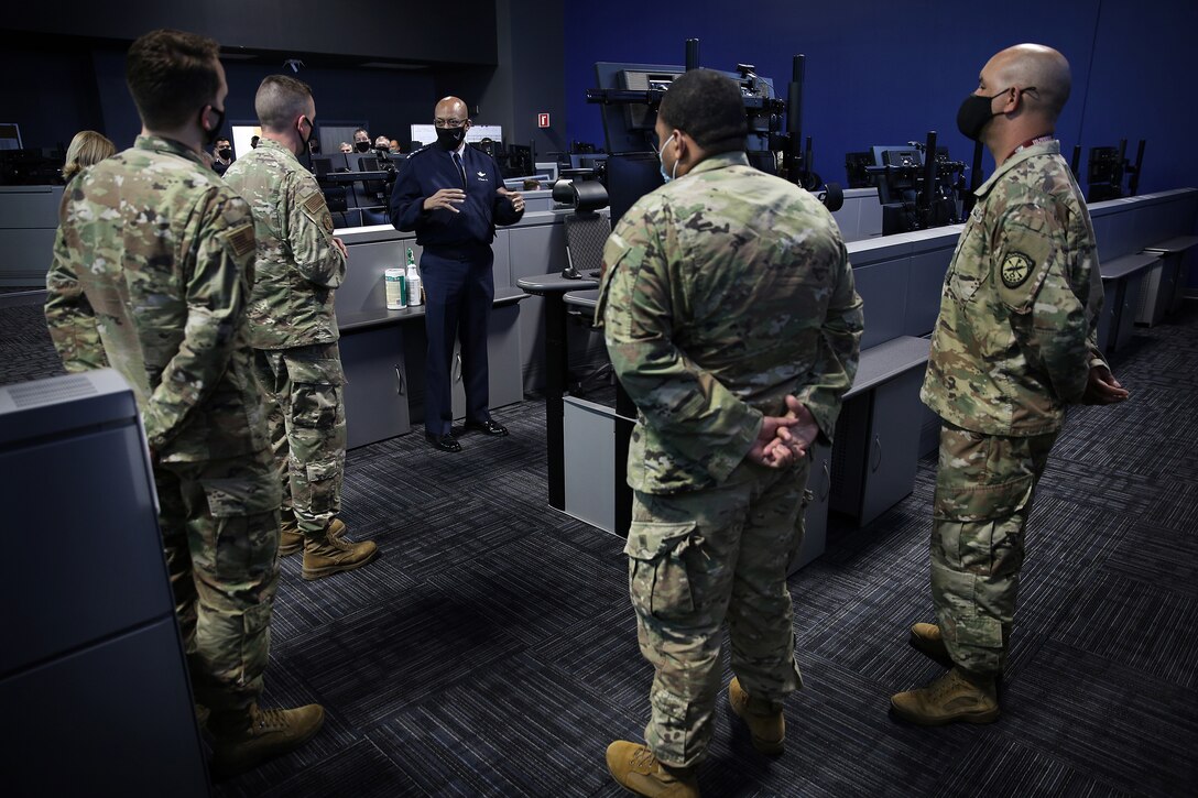 Gen. Charles Q. Brown, Jr., Chief of Staff of the Air Force, speaks with Cyber National Mission Force members about full-spectrum cyber operations during his visit to U.S. Cyber Command, at Fort George G. Meade, Md., May 10, 2021.