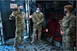 Master Sgt. Andrew Winders, 375th Aeromedical Evacuation Squadron training flight chief, and Senior Airman Jose Herrera, 375th AES Aeromedical Evacuation technician, brief Lt. Gen. Dorothy Hogg, Air Force Surgeon General, for a tour of Team Scott’s medical assets March 8, 2021, on Scott Air Force Base. The 375th AES utilize an old airframe that has all the functions of an aircraft except the wings, which is used to train Airmen on flight procedures. (U.S. Air Force photo by Airman 1st Class Isaac Olivera)