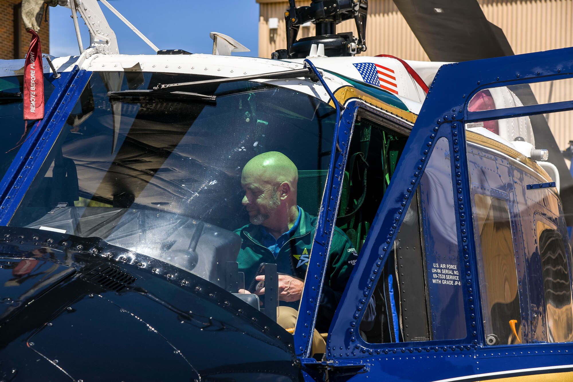 Bobby Pancake, Air Mobility Command civic leader, sits in the pilot seat of a UH-1N “Huey” from the 1st Helicopter Squadron during a visit to Joint Base Andrews, Maryland, May 10, 2021. The UH-1N is a light-lift utility helicopter used to support various missions which include airlift of emergency security forces, security and surveillance of off-base nuclear weapons convoys, and distinguished visitor airlift. (U.S. Air Force photo by Airman 1st Class Stephani Barge)
