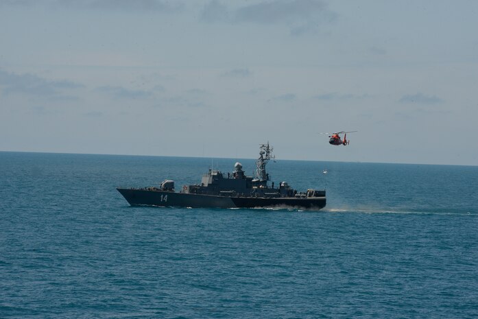 An MH-65 Dolphin helicopter assigned to the Legend-class cutter USCGC Hamilton (WMSL 753), conducts hoisting exercises with Bulgarian surface asset BGS Bodry 14 in the Black Sea, May 13, 2021.