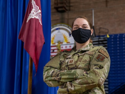 U.S. Air Force Capt. Erin Regan, a clinical nurse, 113th Wing Medical Group, District of Columbia Air National Guard, stands at the entry of the clinic established to support COVID-19 vaccination efforts at the D.C. Armory, May 5, 2021. (U.S. Army National Guard photo by Staff Sgt. Andrew Enriquez)