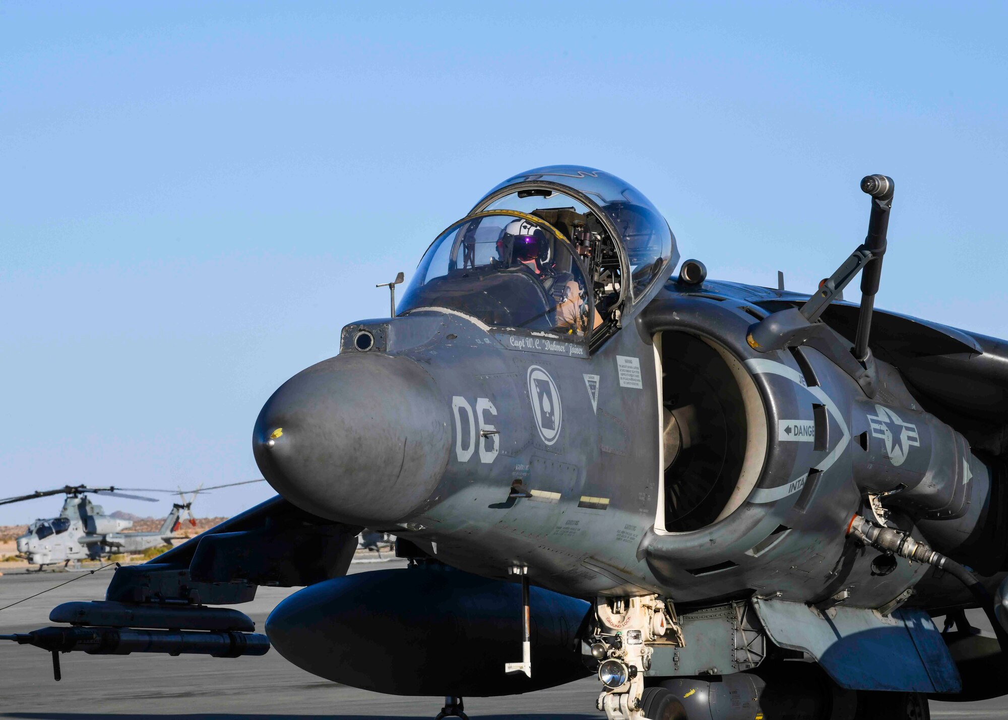 A U.S. Marine parks a Harrier Jump Jet to prepare for hot pit refueling during an exercise at Marine Corps Air Ground Combat Center, California, May 4, 2021. There were over 12,000 participants in this large-scale exercise including the Marine Corps, Air Force, Navy, and Army. (U.S. Air Force photo by Airman 1st Class Kiaundra Miller)
