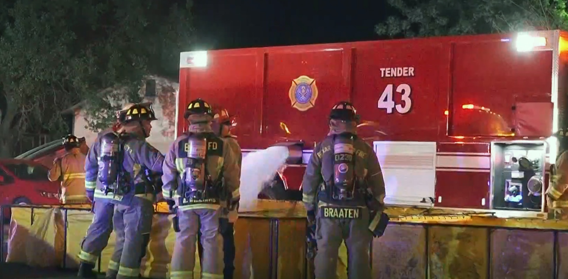 A Joint Base San Antonio Fire Emergency Services water tanker supplies water.