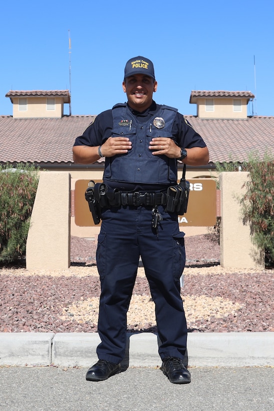 Military Police Officer Karl Bobbio poses for a photo at Marine Corps Air Station (MCAS) Yuma, May 12, 2021. Officer Bobbio received the Civilian Lifesaving Award for exemplifying high levels of professionalism, initiative and selfless dedication to the community of MCAS Yuma. (U.S. Marine Corps photo by LCpl. Matthew Romonoyske-Bean)