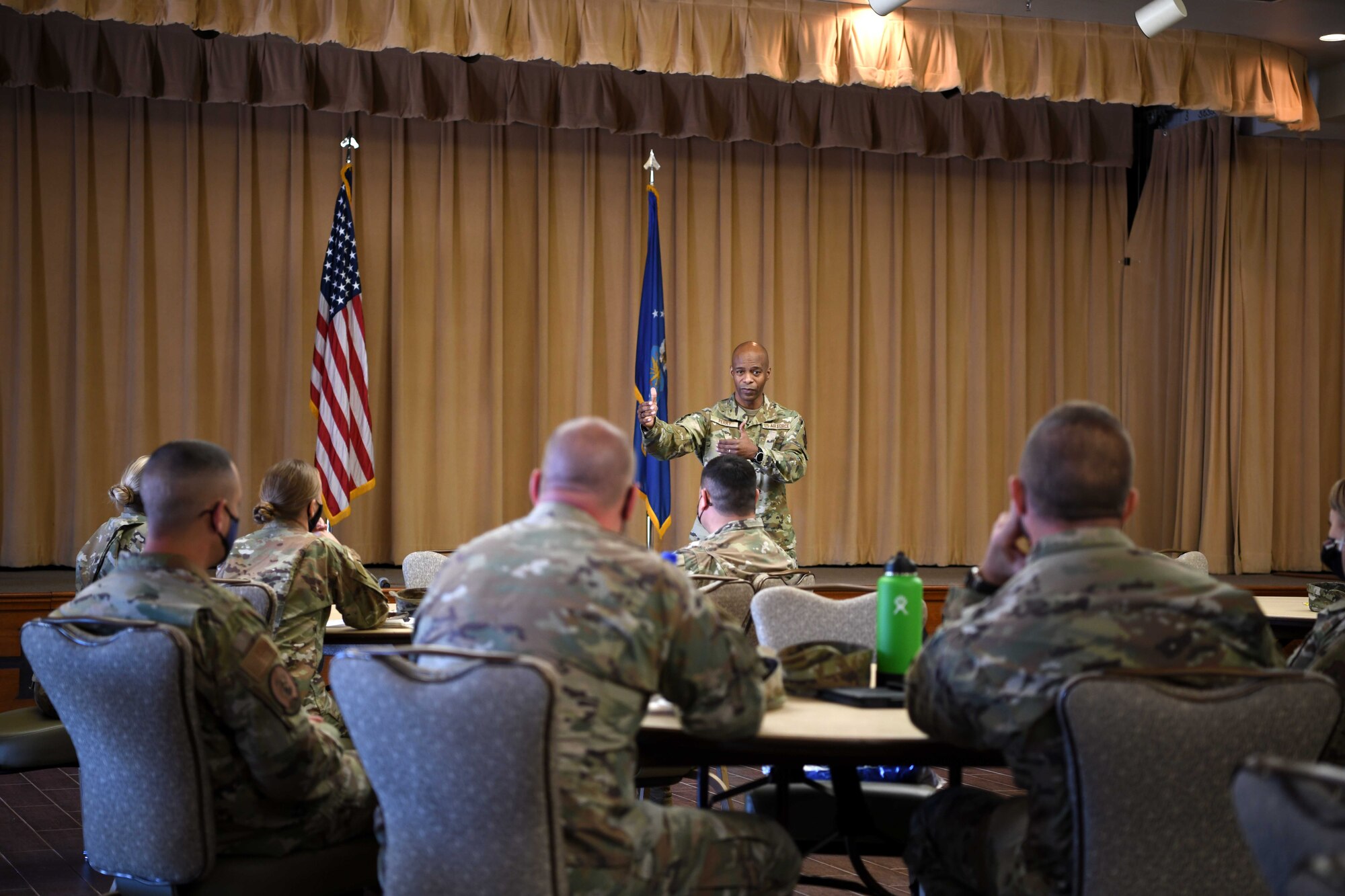 Air Force First Sergeant Special Duty Manager Chief Master Sgt. Mike Perry Jr., also known as Diamond One, explains to the participants of the first-ever Southwest Regional First Sergeants Symposium what issues he is addressing on their behalf at headquarters level and shared a part of his own story to encourage them to look into the gray area, not just the black and white of their units.  The symposium was held at Luke Air Force Base, Ariz., April 26-30. Perry encouraged the Airmen to continue building on the connections that were being fostered during the symposium and understand their role of becoming multi-capable First Sergeants to build multi-capable Airmen.