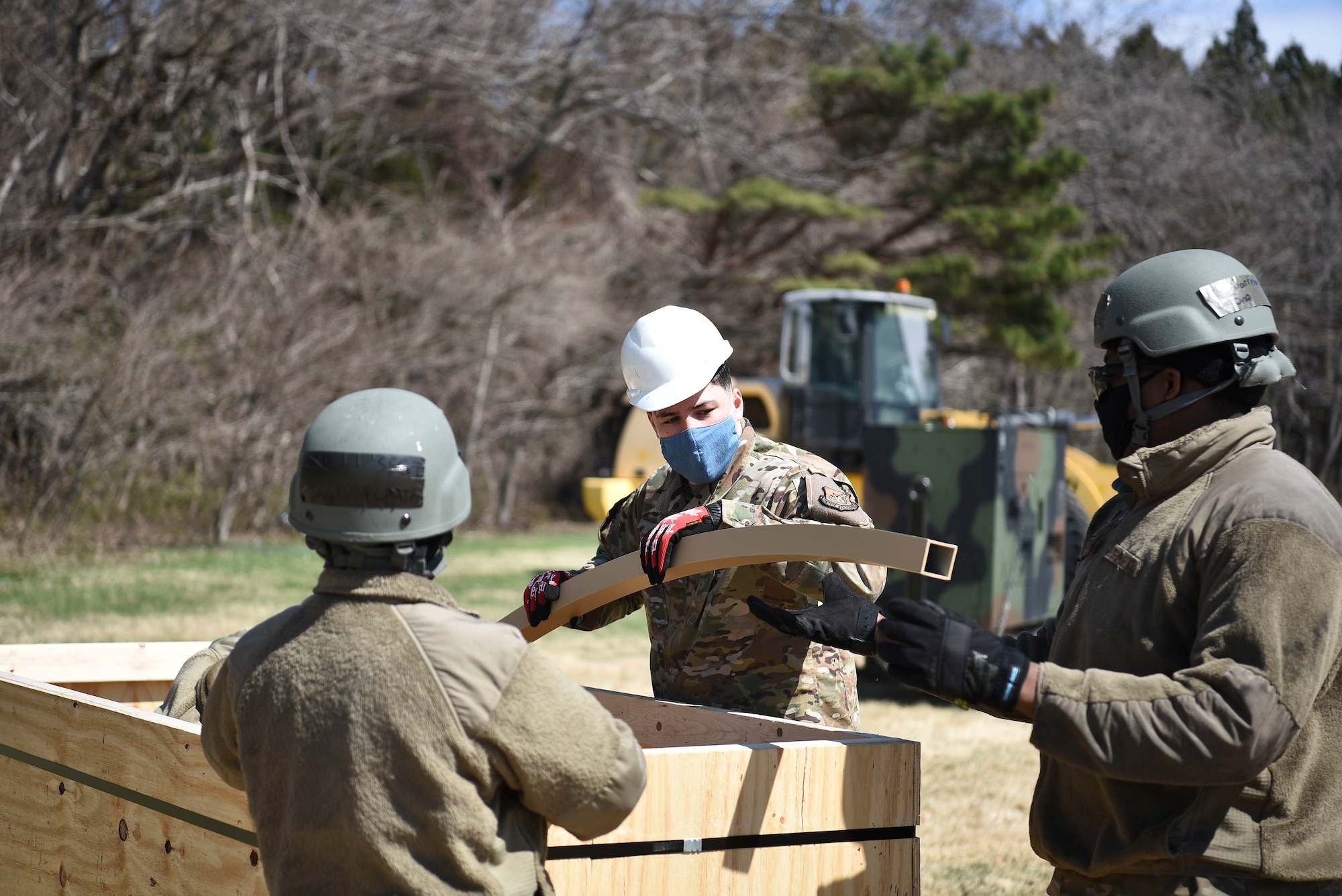 U.S. Air Force Airmen assigned to the 35th Fighter Wing unpack a Small Shelter System during Agile Combat Employment training at Misawa Air Base, Japan, April 8, 2021.
