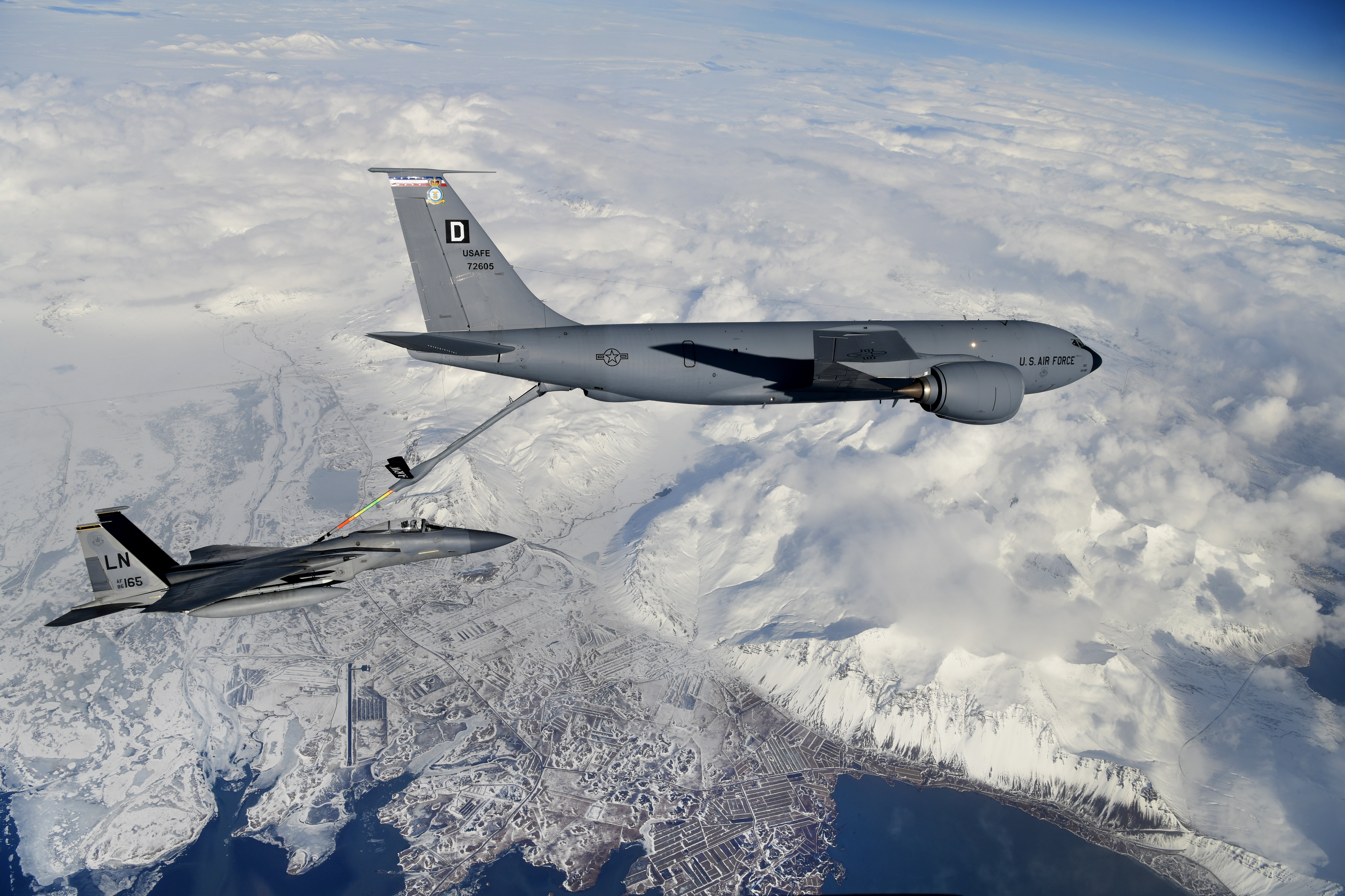 A KC-135 Stratotanker assigned to the 100th Air Refueling Wing and an F-15C Eagle assigned to the 493rd Fighter Squadron conduct routine aerial operations in support of Bomber Task Force Europe over Keflavik, Iceland, March 16, 2020. Bomber missions provide opportunities to train and work with NATO allies and theater partners in combined and joint operations and exercises. (U.S. Air Force photo/ Master Sgt. Matthew Plew)