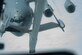 Photo of a U.S. Air Force C-17 Globemaster III assigned to Joint Base Charleston, S.C., moving into position for in-flight refueling from a KC-10 Extender.