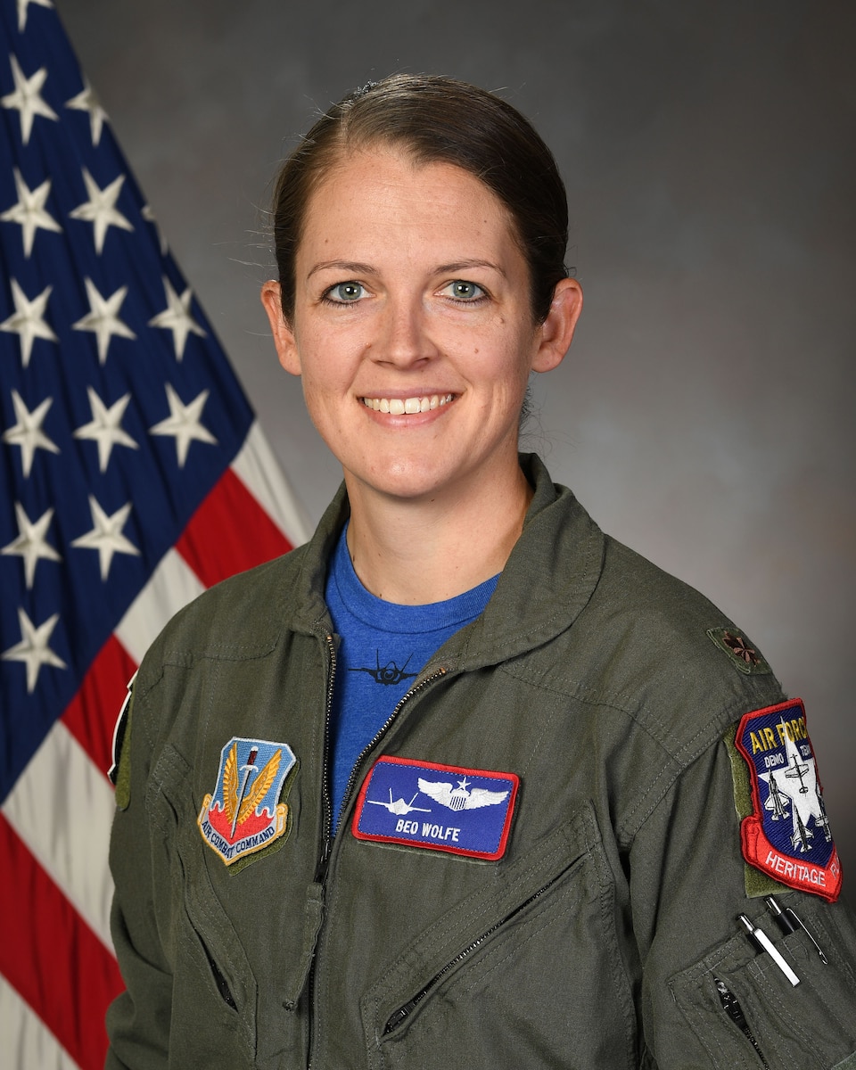 A biographical headshot of Maj. Kristin Wolfe, Air Force pilot