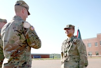 Smith is pinned the rank of Sergeant by his commanding officer