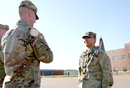 Smith is pinned the rank of Sergeant by his commanding officer