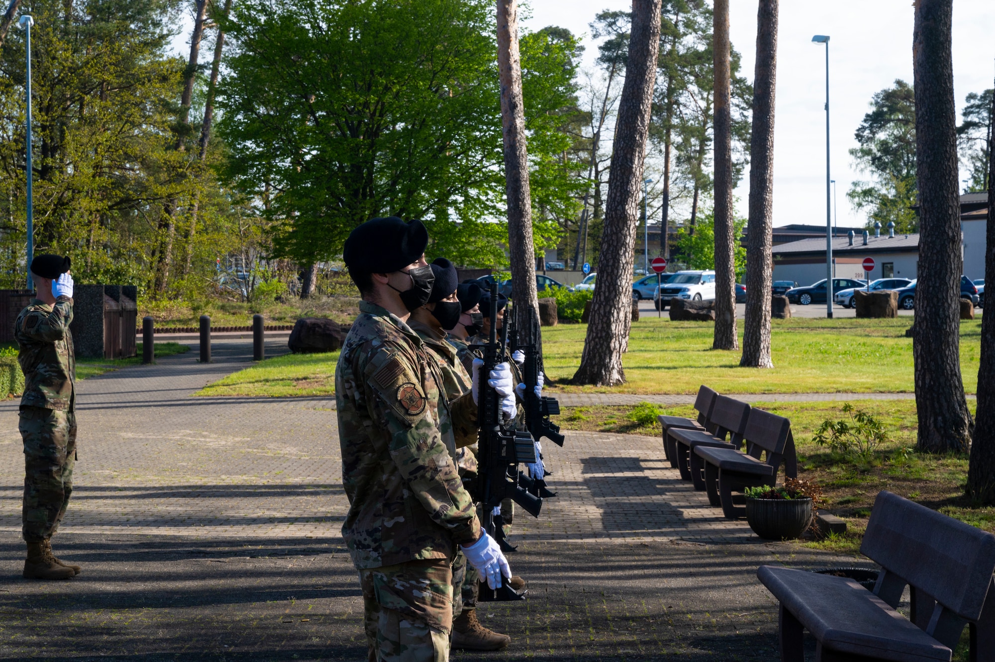 U.S. Air Force Airmen assigned to the 569th U.S. Forces Police Squadron conduct a 21-gun salute during a National Police Week memorial ceremony at Ramstein Air Base