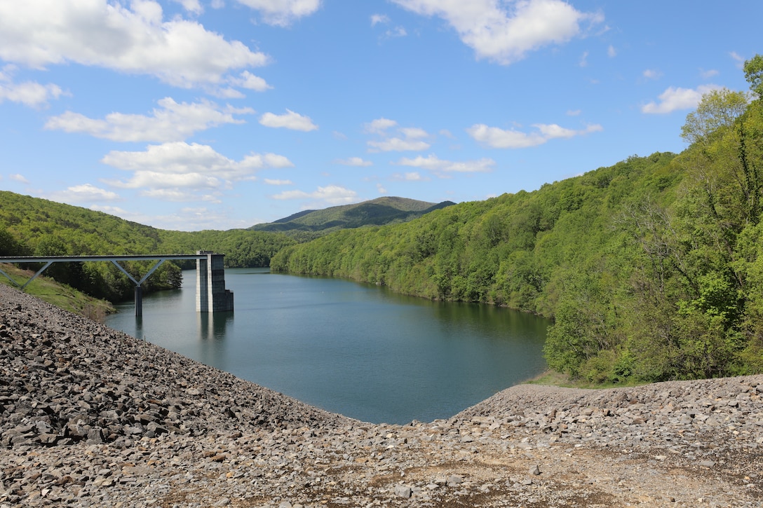 Gathright Dam at the dam crest overlooking upstream at Lake Moomaw. Gathright Dam located in Alleghany County, Va., impounds the water flowing down the Jackson River to create the 2,500 acre Lake Moomaw. The dam has prevented numerous floods over its 30 plus year existence saving countless dollars and lives. (U.S. Army photo/Breeana Harris)