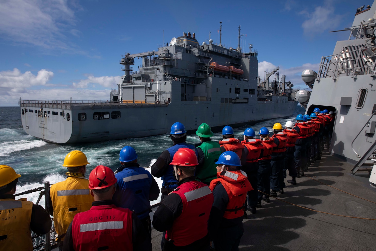 The Arleigh Burke-class guided-missile destroyer USS Paul Ignatius (DDG 117) pulls away from the Military Sealift Command dry cargo and ammunition ship USNS William McLean (T-AKE 12) after a replenishment-at-sea evolution.