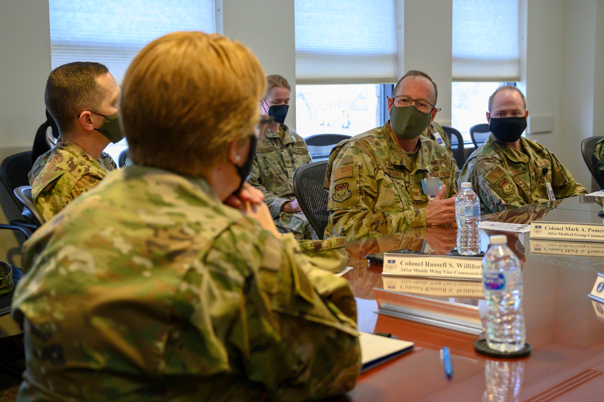 Lt. General Dorothy Hogg, U.S. Air Force surgeon general speaks with Col. Mark Pomerinke, 341st Medical Group commander at the opening brief April 29, 2021 at the basic clinic on Malmstrom Air Force Base, Mont.
