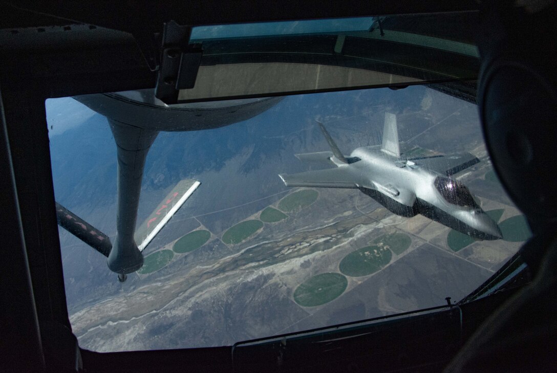 A jet is refueled in air.