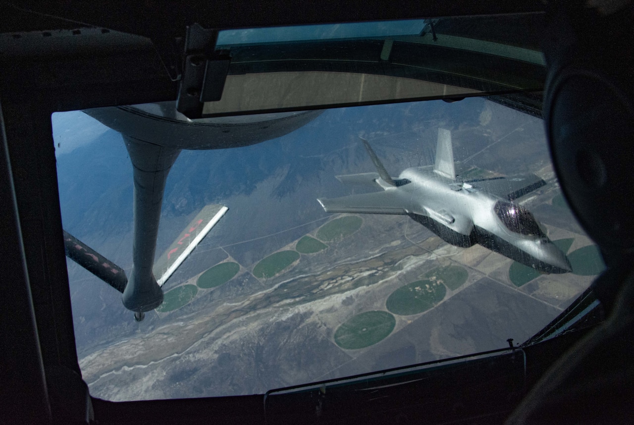 A jet is refueled in air.
