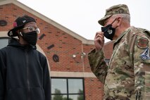 U.S. Air Force Airman 1st Class Jonathan Bacote, 375th Force Support Squadron promotions technician, has a conversation with Chaplin Maj. Gen. Steven Schaick, U.S. Air Force and U.S. Space Force chief of chaplains, during dorm dinner by the Scott Air Force Base Chaplin Corp on Scott AFB, Illinois, May 11, 2021. The dorm dinner, which happens every month, is a way for the Scott AFB Chaplin Corps to provide food and connect with Airmen living in the Scott AFB dorms. (U.S. Air Force photo by Airman 1st Class Isaac Olivera)