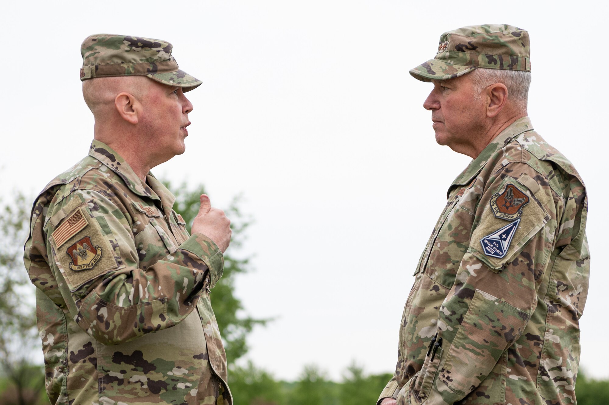 U.S. Air Force Chaplin Lt. Col. Michael Howard, 375th Air Mobility Wing chaplin, has a conversation with Chaplin Maj. Gen. Steven Schaick, U.S. Air Force and U.S. Space Force chief of chaplains, during dorm dinner by the Scott Air Force Base Chaplin Corp on Scott AFB, Illinois, May 11, 2021. The dorm dinner, which happens every month, is a way for the Scott AFB Chaplin Corps to provide food and connect with Airmen living on the Scott AFB dorms. (U.S. Air Force photo by Airman 1st Class Isaac Olivera)