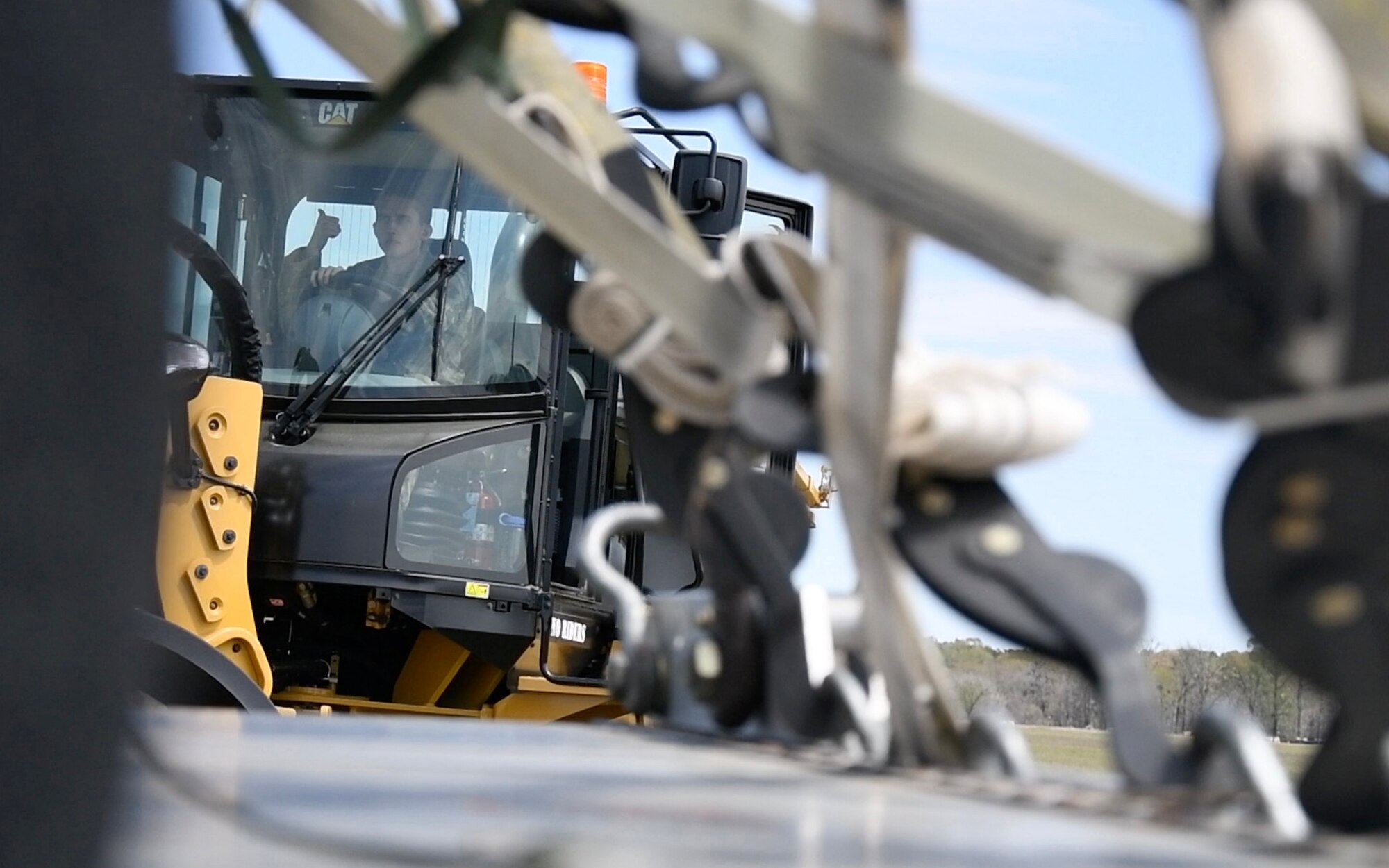 a forklift loading cargo onto a truck