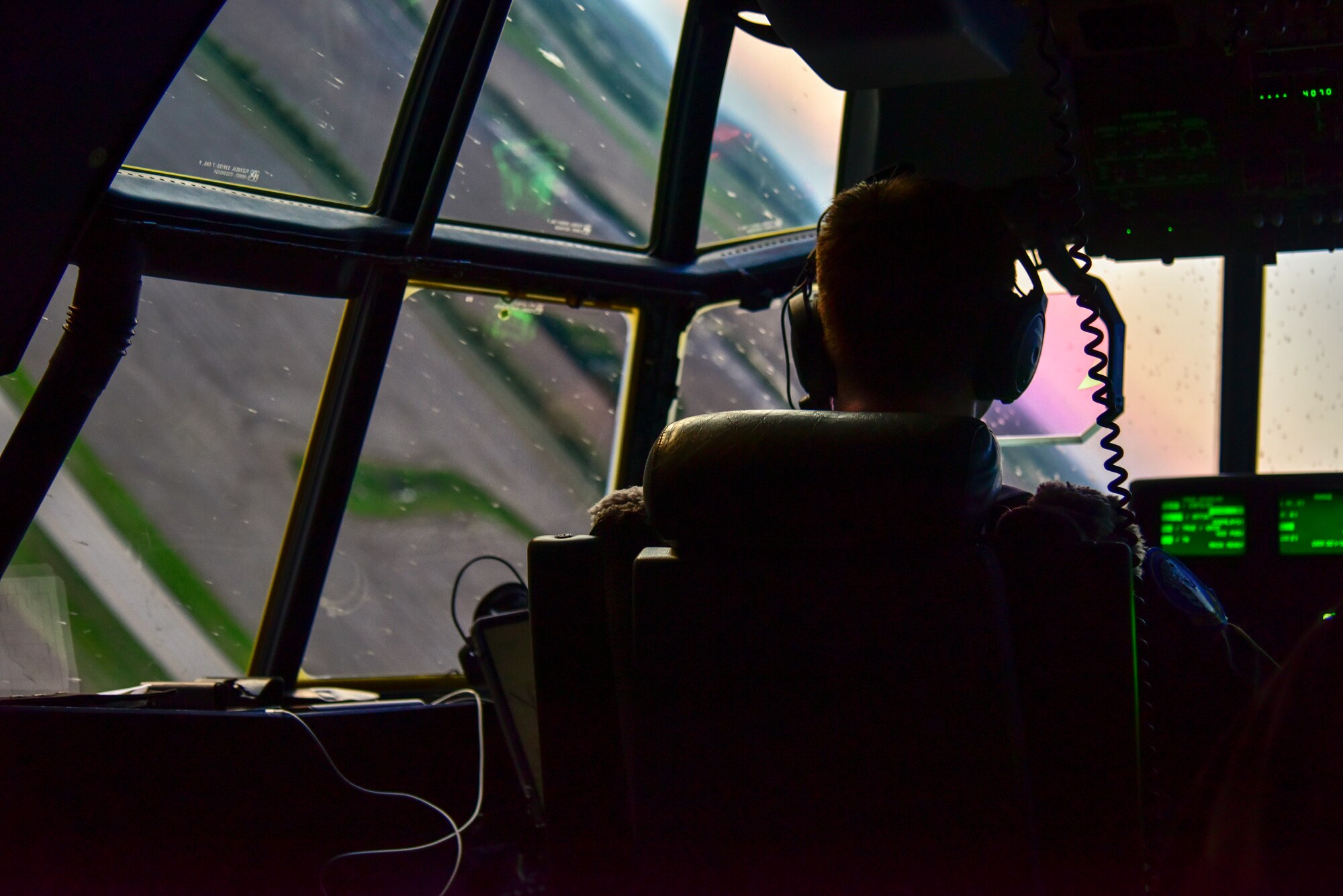 U.S. Air Force Reserve 1st Lt. Blaine Von Berge, aircraft commander, banks the C-130J into a turn during a training exercise with the 442d Fighter Wing at Salina, Kansas, May 12, 2021. The Air Force Reserve 327th Airlift Squadron provided agile combat support, enabling a variety of cargo handling training for maintainers, expanding their combat skillsets. (U.S. Air Force photo by Senior Airman Kalee Sexton)