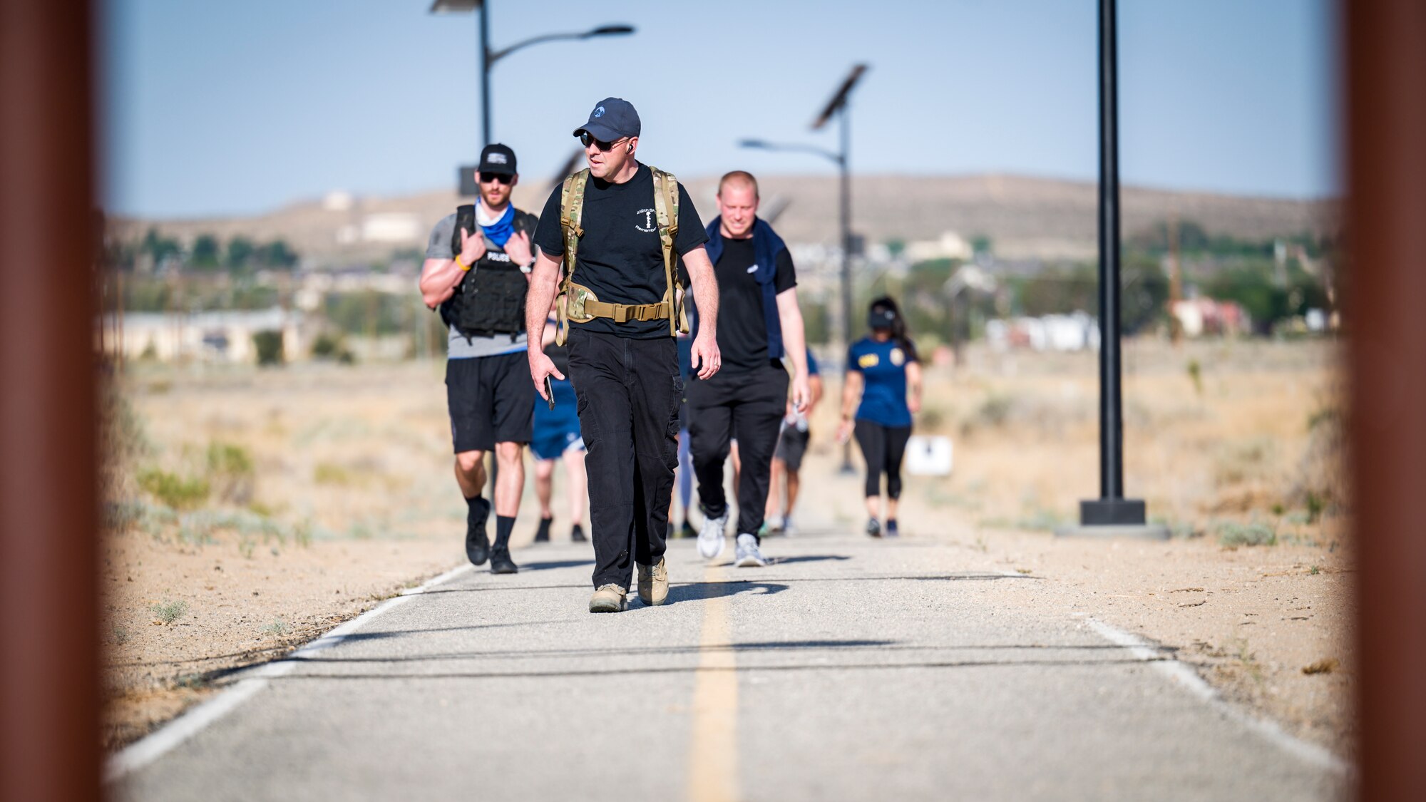 Lt. Col. Joseph Bincarousky, 412th Security Forces Squadron commander, completes the Annual Police Week Run/Ruck/Walk Event at Edwards Air Force Base, California, May 10. (Air Force photo by Giancarlo Casem)