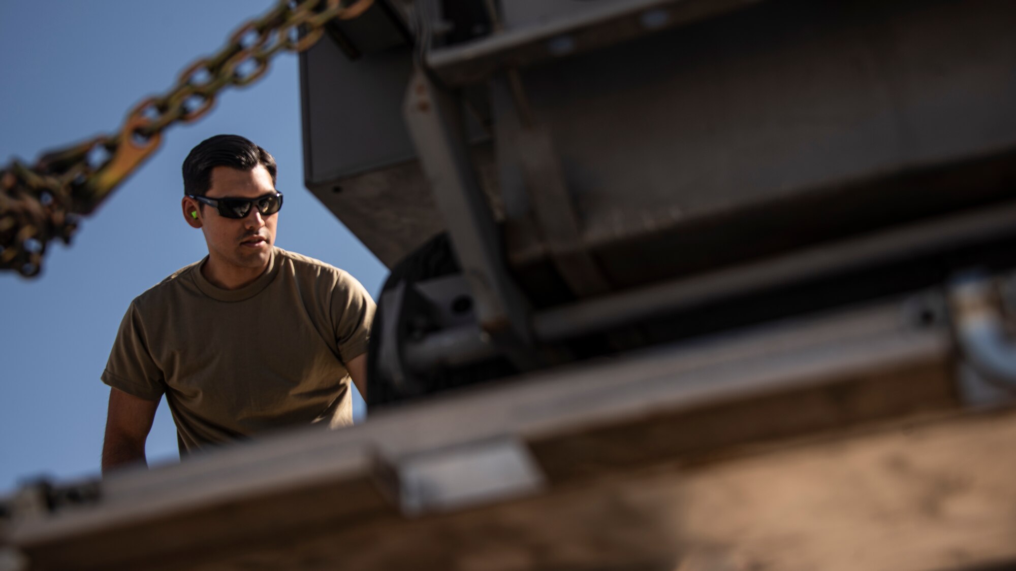 A photo of an Airman processing for an exercise