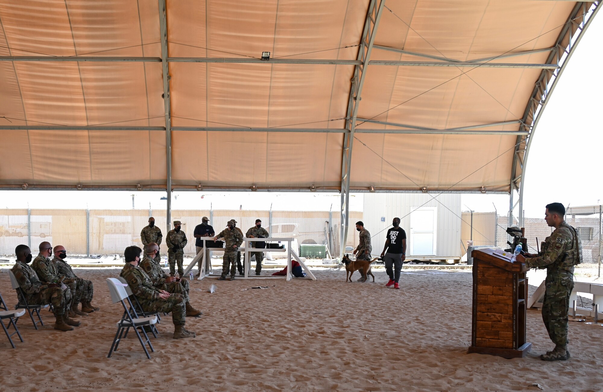 A photo of a ceremony and K-9 demonstration