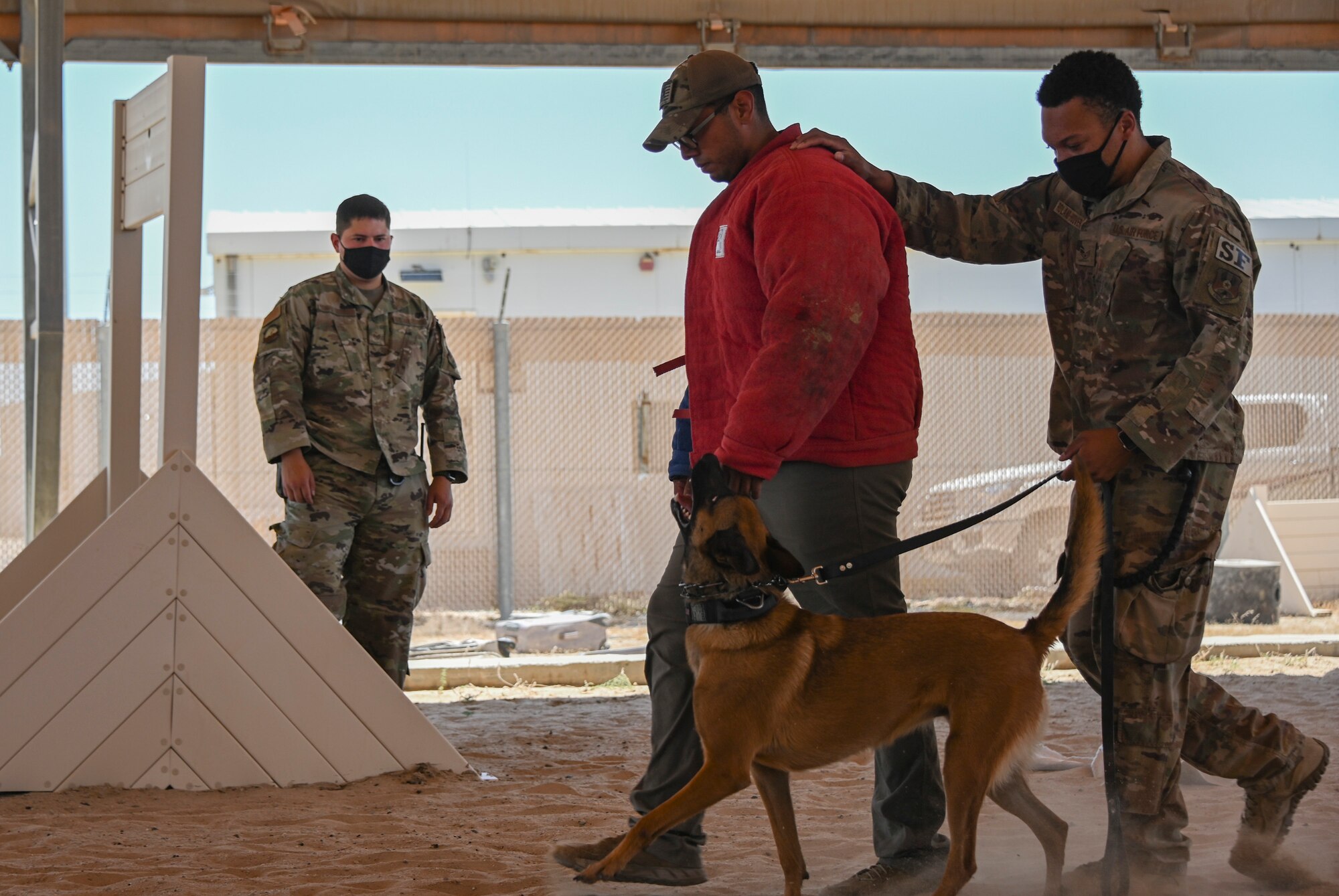 A photo of a ceremony and K-9 demonstration