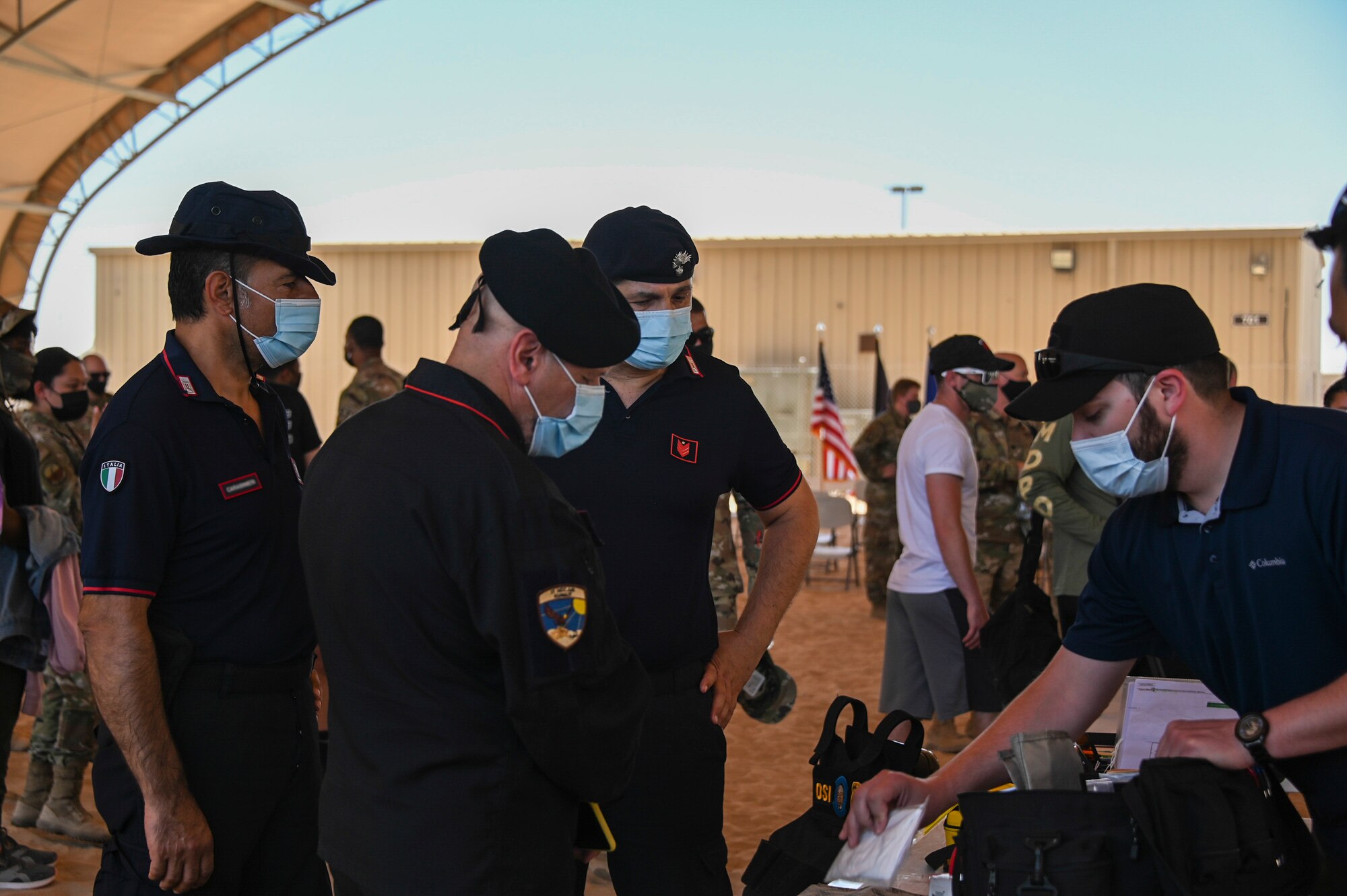 A photo of a ceremony and K-9 demonstration