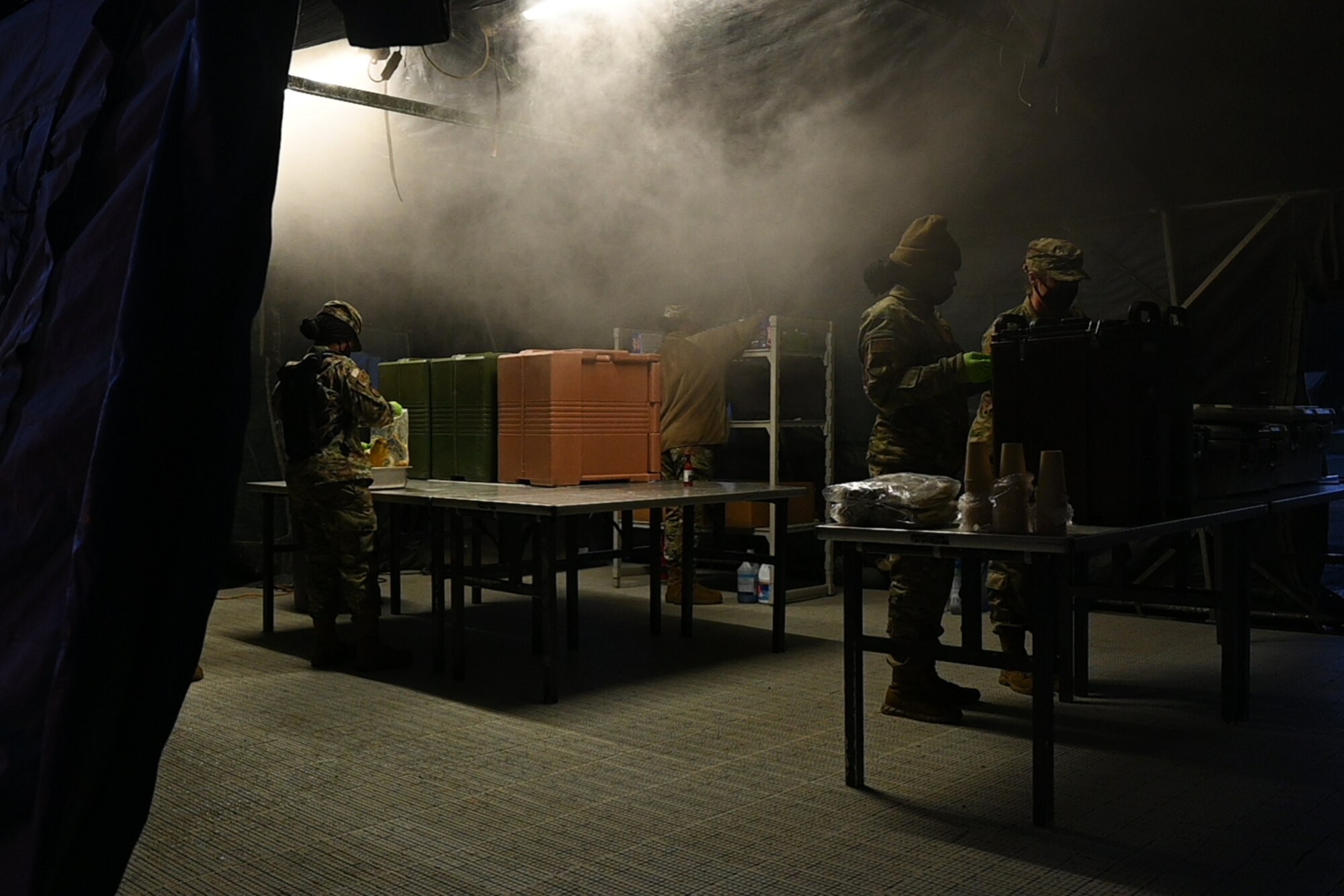 Photo of Airmen cooking breakfast.