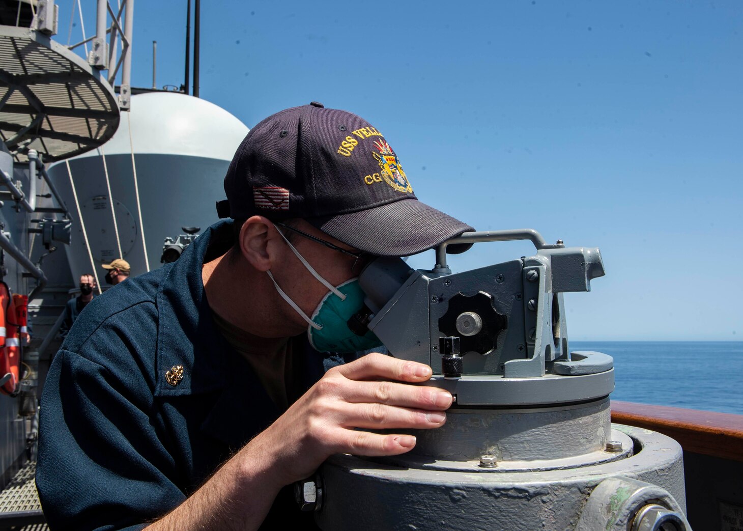 Chief Quartermaster John Grady, from Niagara Falls, New York, takes landmark bearings as the Ticonderoga-class guided-missile cruiser USS Vella Gulf (CG 72) May 12, 2021. Vella Gulf is on a routine deployment in the U.S. Sixth Fleet area of operations in support of U.S. national interests and security in Europe and Africa.