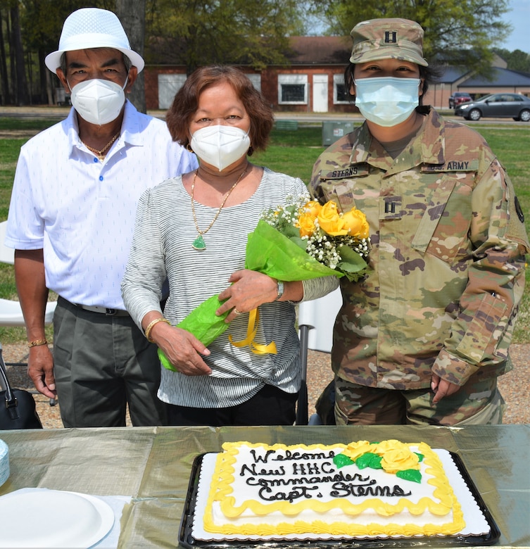 Capt. Theang Sterns, incoming 94th TD-FS Headquarters and Headquarters Company commander, celebrates with her parents following the unit's change of command ceremony at Fort Lee's Combined Arms Support Command Headquarters. The ceremony was held to bid farewell to Capt. Alex Singh, outgoing 94th TD-FS HHC commander, welcomed Sterns as the HHC commander on April 9, 2021. (Photo by Maj. Ebony Gay, 94th TD-FS Public Affairs Office)